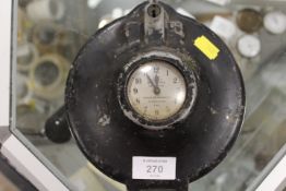 A VINTAGE THE SERVICE RECORDERS LIMITED GLOUCESTER ENGLAND CLOCK IN LOCKED METAL CASING ( NO KEY )