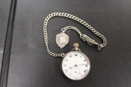 A GENTS ANTIQUE SILVER WATCH AND SILVER ALBERT CHAIN