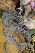 A SET OF THREE METAL FRENCH BIRD CAGES