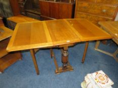 AN OAK DROPLEAF TABLE AND OCCASIONAL TABLE (2)