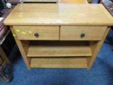 A SMALL LIGHT OAK EFFECT TWO DRAWER SIDE TABLE - 91.5 cm