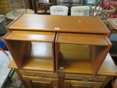 A RETRO TILE NEST OF THREE TABLES