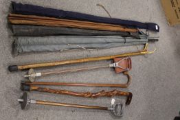 A QUANTITY OF FIELD SPORTS ITEMS TO INCLUDE SHOOTING STICKS, FISHING RODS ETC