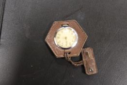 A VINTAGE SWISS 15 JEWELS WATCH WITH SKELETON BACK