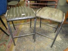 TWO MODERN LEATHER STOOLS (SLIGHTLY DIFFERENT COLOUR)