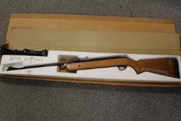 A VINTAGE BSA MERCURY POINT 22 AIR RIFLE IN ORIGINAL BOX TOGETHER WITH A CLAMP ON TELESCOPE SIGHT