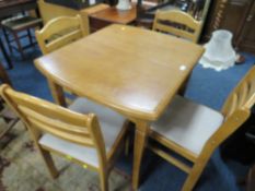 A MODERN SMALL KITCHEN TABLE AND FOUR CHAIRS