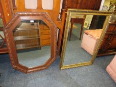 AN OAK EARLY 20TH CENTURY MIRROR TOGETHER WITH A MODERN GILT FRAMED MIRROR (2)