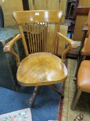 A VINTAGE SWIVEL OFFICE ARMCHAIR