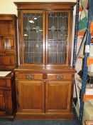 AN OAK EARLY 20TH CENTURY LEADED / GLAZED BOOKCASE - W 106 cm