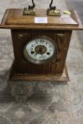 A OAK CASED MANTLE CLOCK