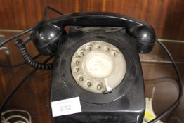 A VINTAGE BLACK TELEPHONE