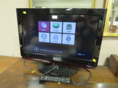 AN LG 26| FLATSCREEN TV WITH REMOTE - HOUSE CLEARANCE