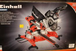 A BOXED EINHELL ANGLE CHOP SAW