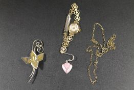 A HALLMARKED 9CT GOLD REGENCY WATCH TOGETHER WITH AN ASSORTMENT COSTUME JEWELLERY