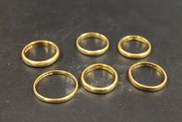 SIX 22CT GOLD WEDDING RINGS