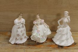 A ROYAL DOULTON FIGURINE 'LUCY' TOGETHER WITH 'SUMMER ROSE' AND A COALPORT FIGURINE 'FLEUR' (3)