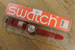 A VINTAGE SWATCH WATCH IN ORIGINAL CASE