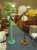 A RETRO STYLE LAMP TOGETHER WITH A FLORAL LAMP