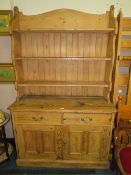 AN ANTIQUE PINE KITCHEN DRESSER - H 208 cm, W 128 cm