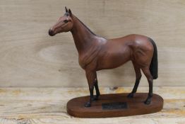 A LARGE MATT FINISH BESWICK MODEL OF A HORSE ON PLINTH 'RED RUM' - MARKED AS A SECOND