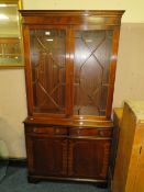 A REPRODUCTION MAHOGANY GLAZED BOOKCASE