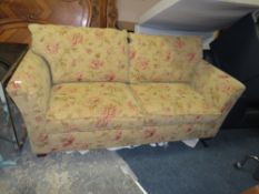 A MODERN UPHOLSTERED BED SETTEE