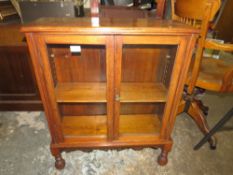 A SMALL MAHOGANY TWO DOOR GLAZED BOOKCASE - W 69 cm