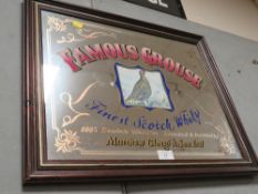 A FRAMED ADVERTISING MIRROR FOR THE FAMOUS GROUSE SCOTCH WHISKY BY MATTHEW GLOAG AND SONS LTD