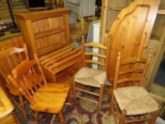 A HONEY PINE BOOKCASE, HEADBOARD, TABLE AND FOUR CHAIRS PLUS A MEDIA CABINET