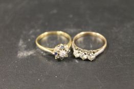 A THREE STONE DIAMOND RING HALLMARK RUBBED APPROX 2G TOGETHER WITH AN UNMARKED SAPPHIRE AND