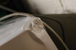 AN UNDER COUNTER FREEZER - SLIGHT DAMAGE TO CASE