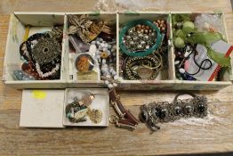 A TRAY OF ASSORTED COSTUME JEWELLERY AND WATCHES ETC
