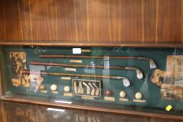 A GOLF THEMED NOVELTY GLAZED DISPLAY CASE