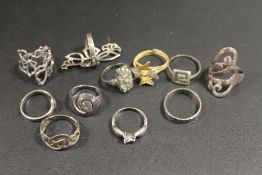ELEVEN ASSORTED SILVER RINGS