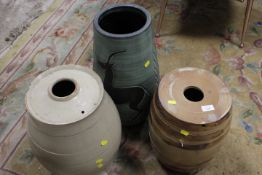 A LARGE CERAMIC VASE TOGETHER WITH TWO CERAMIC BARRELS