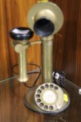 A VINTAGE BRASS STICK TELEPHONE