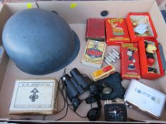 A TRAY OF COLLECTABLES TO INCLUDE VINTAGE NATO HELMET, BINOCULARS, VINTAGE PLAYING CARDS, BAMBI &