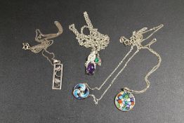 FOUR SILVER PENDANT NECKLACES