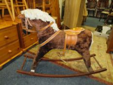 A VINTAGE CHILDS ROCKING HORSE