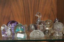 A SELECTION OF GLASS PAPERWEIGHTS AND ANIMAL FIGURES