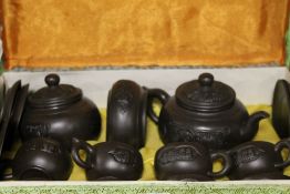 A DECORATIVE CASED ORIENTAL CHINESE TEA SET