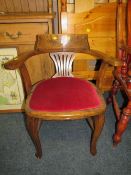 A VINTAGE OAK ARMCHAIR
