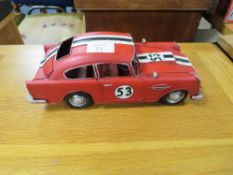 A TIN PLATE ASTON MARTIN CAR