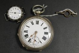 A SILVER CASED TRENCH WATCH AND A VICTORIAN GENTS POCKET WATCH (2)
