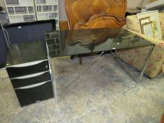 A MODERN GLASS TOP DESK PLUS A SMALL FILING CABINET