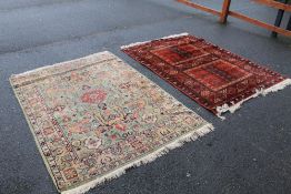 TWO EASTERN WOOLLEN RUGS