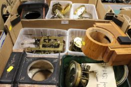 TWO TRAYS OF CLOCK MOVEMENTS AND PARTS