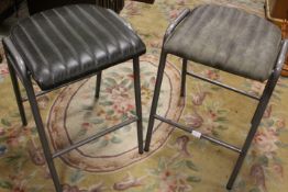 TWO MODERN LEATHER STOOLS (SLIGHTLY DIFFERENT COLOUR)