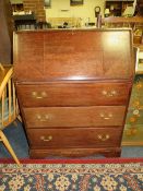 A VINTAGE OAK BUREAU WITH BRASS CARRY HANDLES